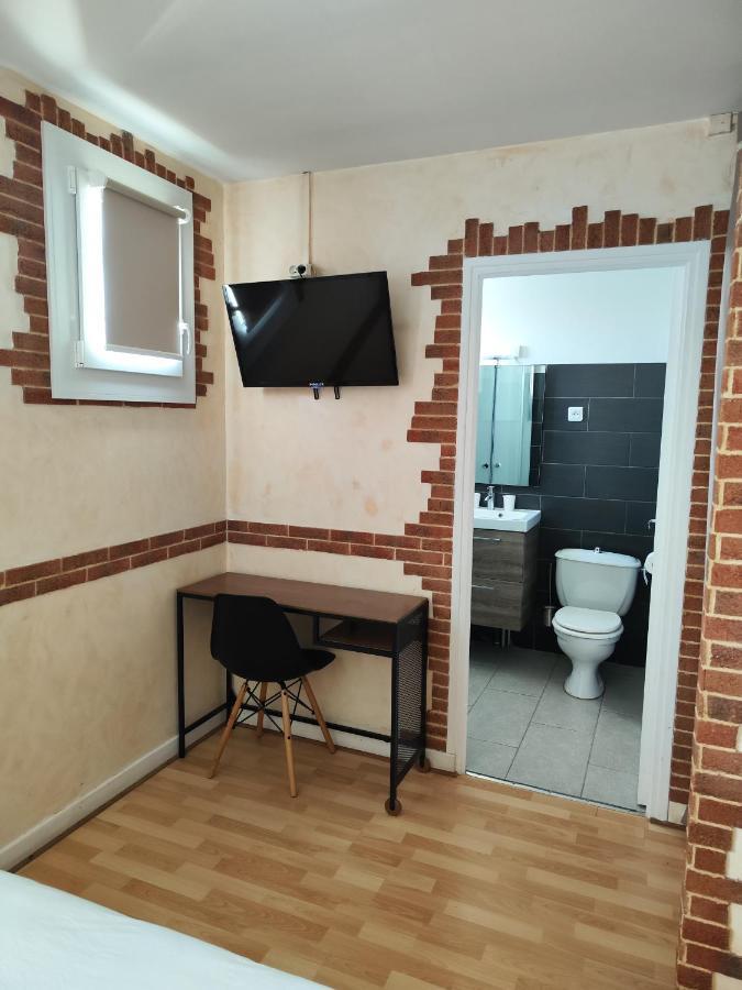 Hotel Le Sporting Beaumont-sur-Leze Exterior foto